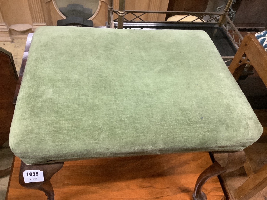 A mahogany stool with upholstered seat